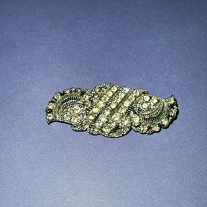 VINTAGE SILVER TONED BROOCH